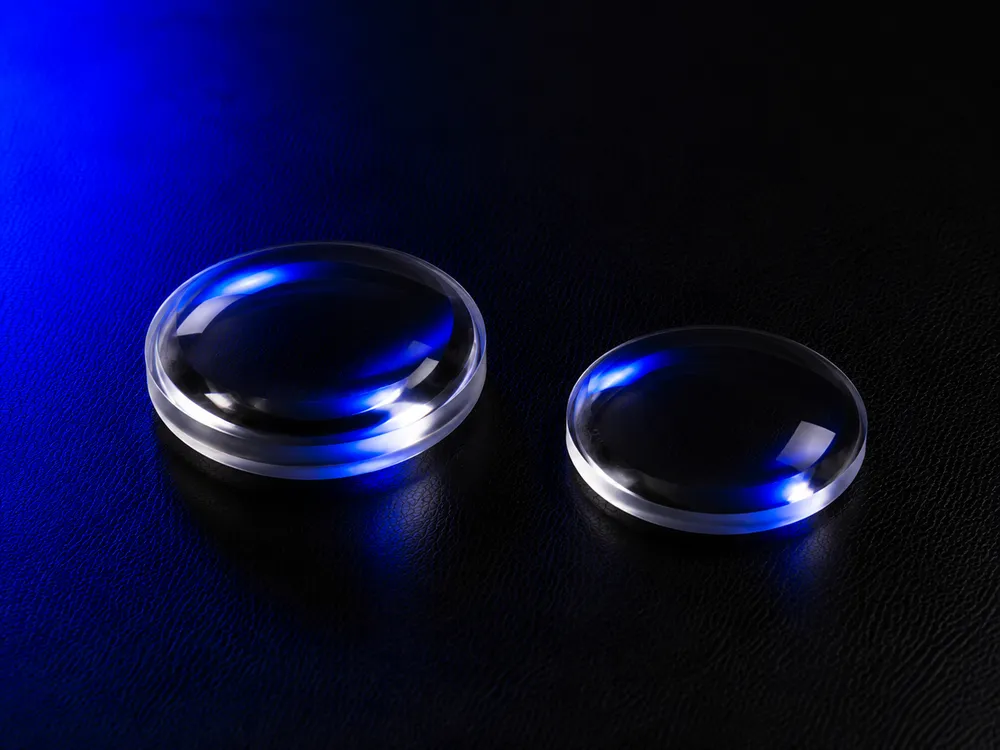 Precision laser lenses for focusing and collimation